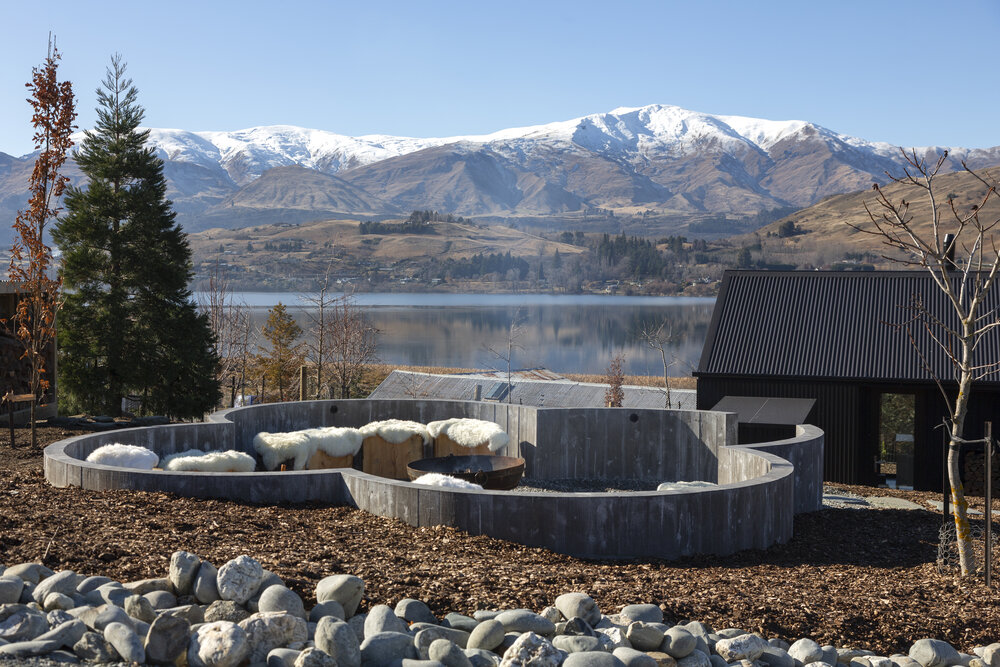 Firepit with view of lake and mountains